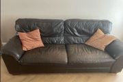 Three seater dark leather sofa