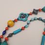 Vintage Tribal Necklace Lapis, Coral, Amber Beads & Howlite Clover Charms Image 4
