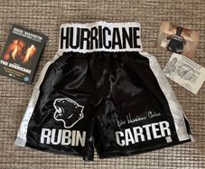Rubin 'Hurricane' Carter signed boxing trunks. Comes with COA, photo & FREE Denzel Washington DVD movie