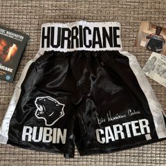 Rubin 'Hurricane' Carter signed boxing trunks. Comes with COA, photo & FREE Denzel Washington DVD movie