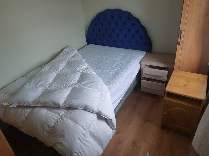 Lockers, chest of drawers, bed and small wardrobe