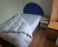 Lockers, chest of drawers, bed and small wardrobe