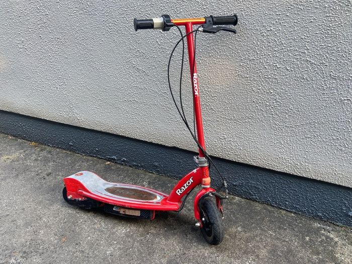 Red Razor electric kids scooter