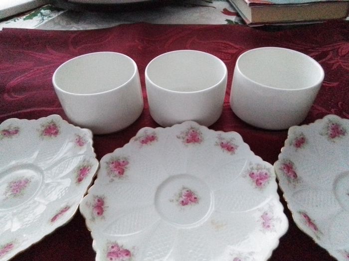 Six Pretty China Saucers