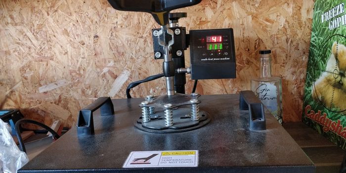 Heat press machine with mug and hat attachments