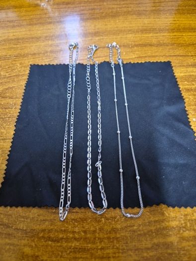 3 silver colour chains