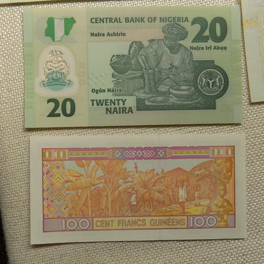 Lot of 9 Uncirculated Banknotes from Africa.Picturesque,Clean,Crisp,Bright condition.No 12.