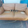 Brown leather sofa and matching foot poof Image 2