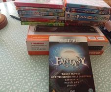 Brand New Sealed Toshiba DVD Player + 15 Kids Movies Bundle