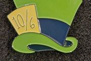 Mad hatter ! , pin back badge.