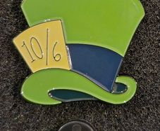 Mad hatter ! , pin back badge.