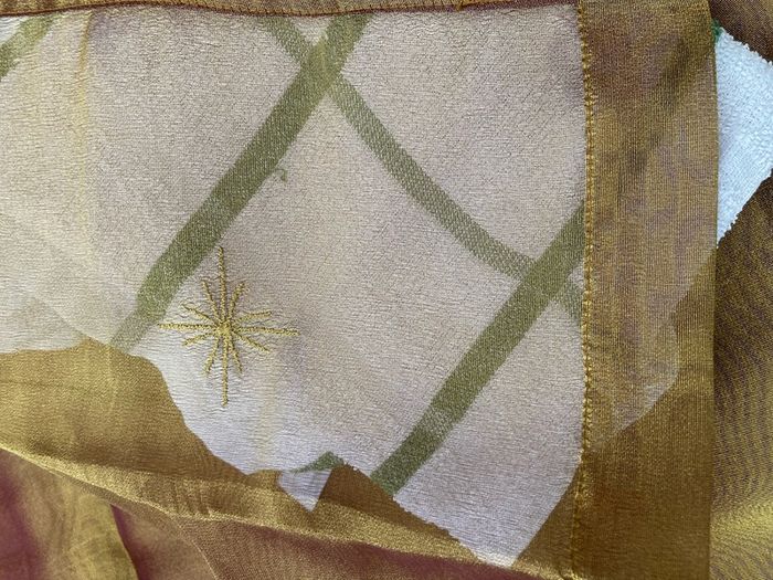 A Pair of Tab Top Voile Curtains. ( Gold) 110 x 230 cm New.