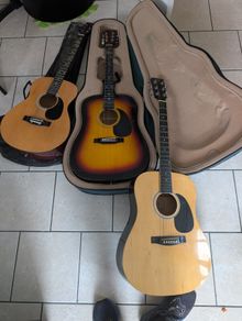 Three acoustic guitars