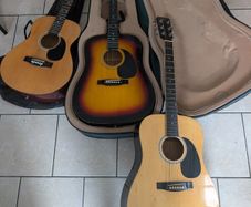 Three acoustic guitars