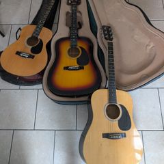 Three acoustic guitars