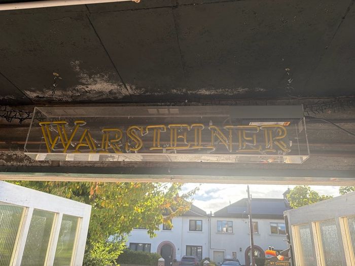 Man cave home bar neon warsteiner beer sign