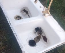 Double bowl ceramic sink with brass mixer tap