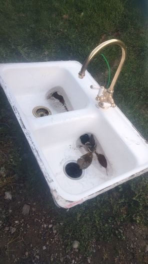 Double bowl ceramic sink with brass mixer tap