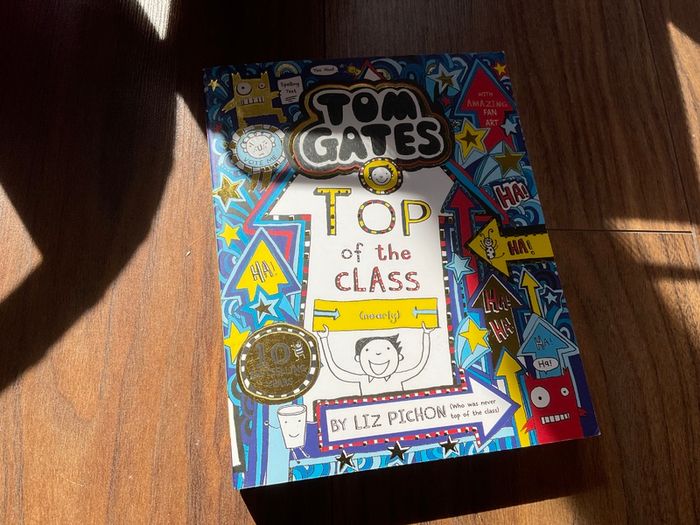 Tom gates top of the class