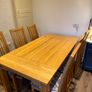 Solid oak dining table & 6 reupholstered dining chairs Image 4
