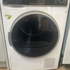 Heat pump tumble dryer
