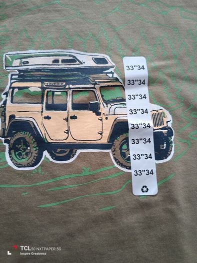 NEW.boy's t-shirt . Size 33/34