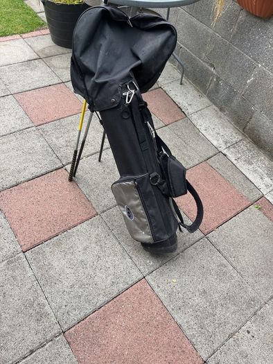 Left hand golf clubs and stand
