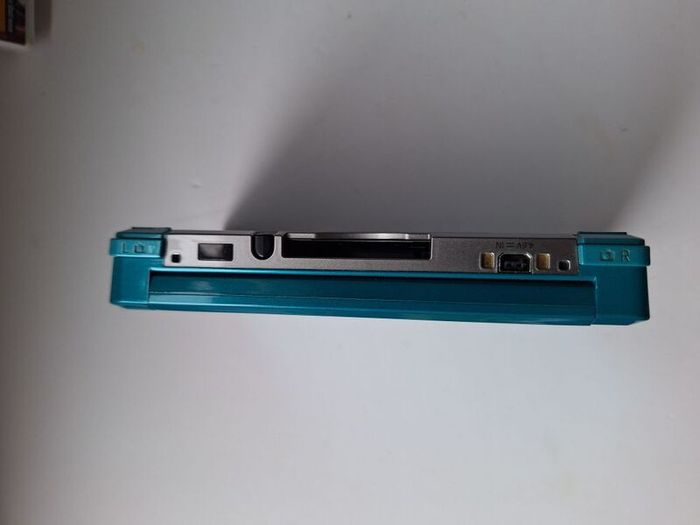 Aqua Blue Nintendo 3DS with games