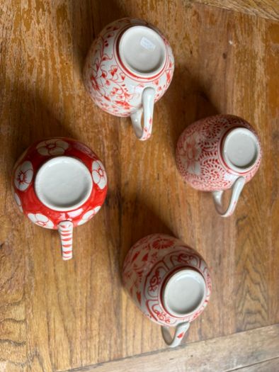 Four decorative cups