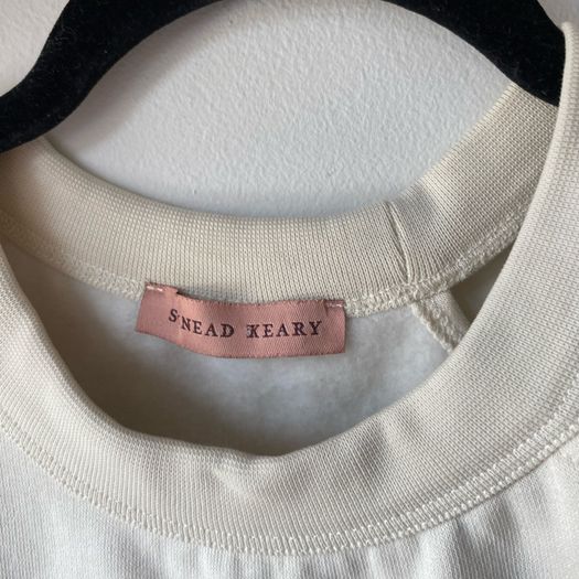 Sinead Keary The Label Asymmetric Cutout Cream Sweatshirt