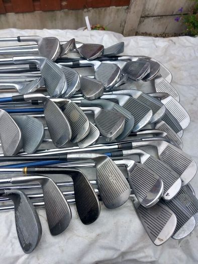 A selection of golf clubs and bags. NOT SELLING SEPARATE