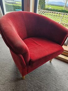 Red fabric tub chair