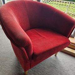 Red fabric tub chair