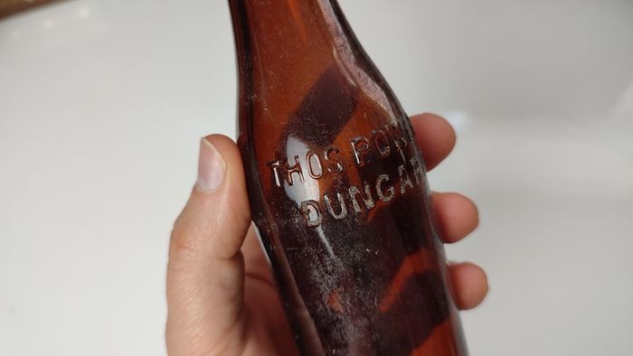 401 - Vintage Thos Power Dungarvan Dark Amber Glass Collectible Decorative Bottle