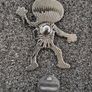 Dancing skeleton ,  pin back badge. Image 2