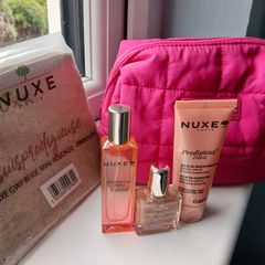 Nuxe pink cosmetic bag with Prodigieux Floral parfum, shower gel and oil, all new