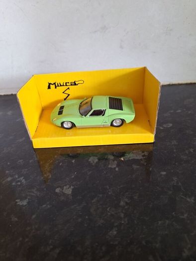 Four vintage boxed diecast models