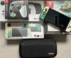 Nintendo Switch OLED Zelda Edition Bundle + Sealed Zelda Pro Controller + Skull & Co Grip & Maxcarry Case