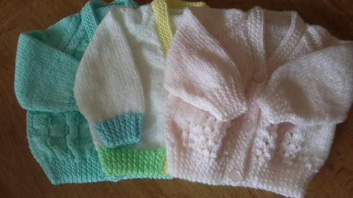 Beautiful hand knitted baby cardigans