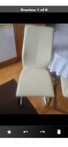 cream leather chairs