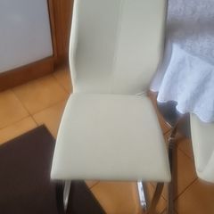 cream leather chairs