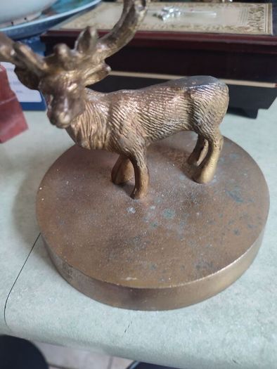 Vintage Brass effect Deer on circle base.