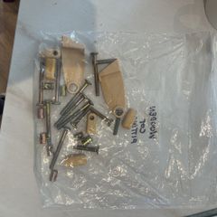 Fittings for drop down side cot