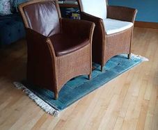 Pair of Vincent Sheppard armchairs with cushions