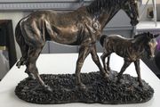 Vintage Crosa mare and foal figurine