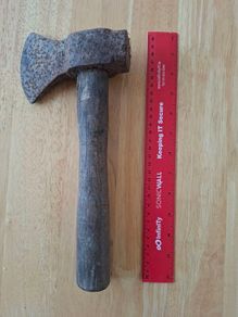 Old hatchet, hand axe.