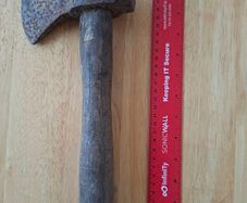 Old hatchet, hand axe.