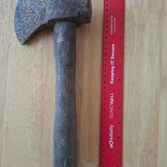 Old hatchet, hand axe.