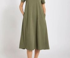 New olive green cotton jersey T-shirt dress features a relaxed oversized fit and convenient side seam pockets