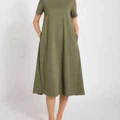 New olive green cotton jersey T-shirt dress features a relaxed oversized fit and convenient side seam pockets